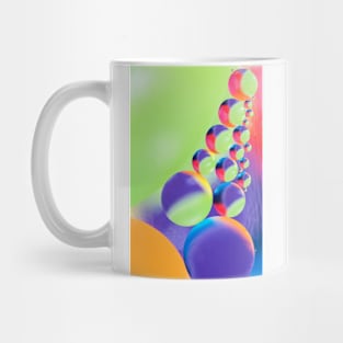 Colorful close up of oil drops in water Mug